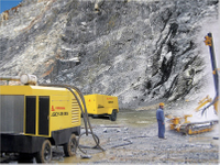 Drill Rig And Screw Compressor In Mining Site